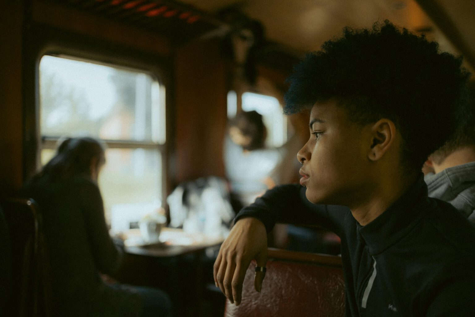 Young person on a train