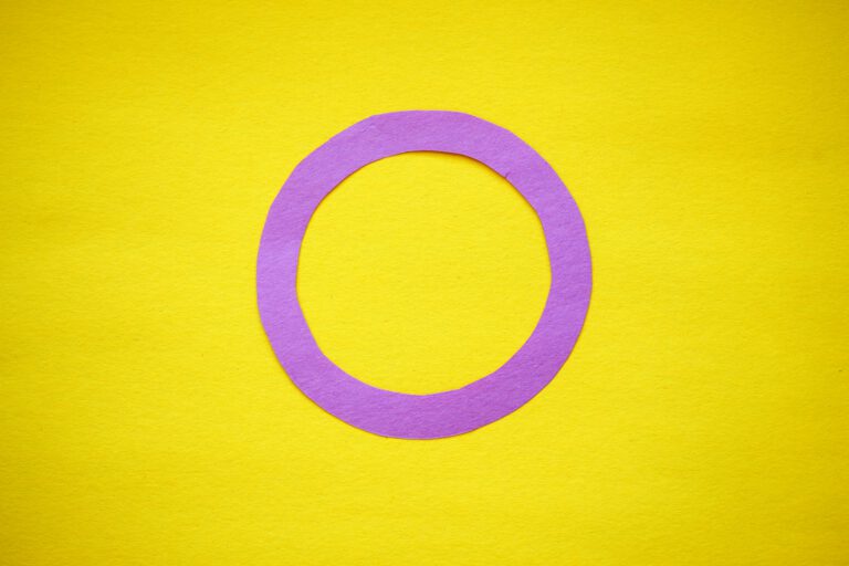 Intersex symbol: Purple ring on a yellow background