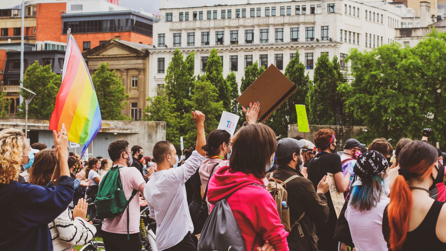protesters with LGBTI flag